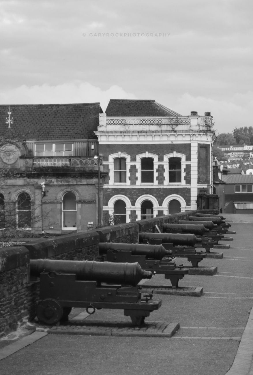 Black and white photograph of cannons on Derry's Walls