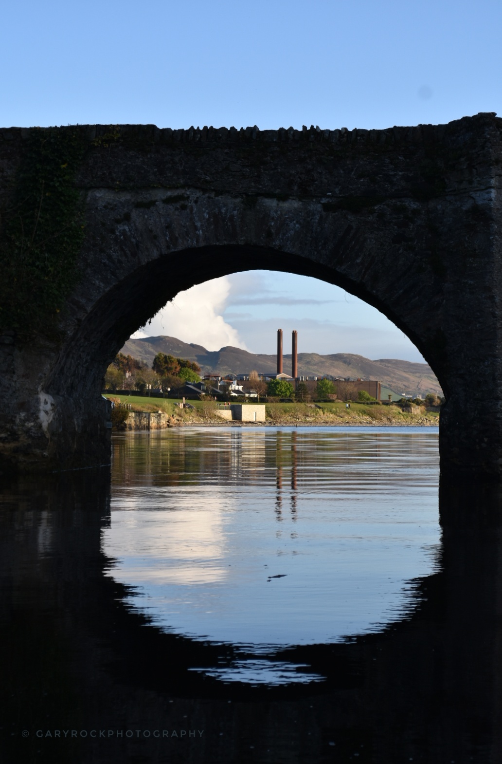 Fruit of the Loom chimneys viewed from under Castle Bridge in Buncrana