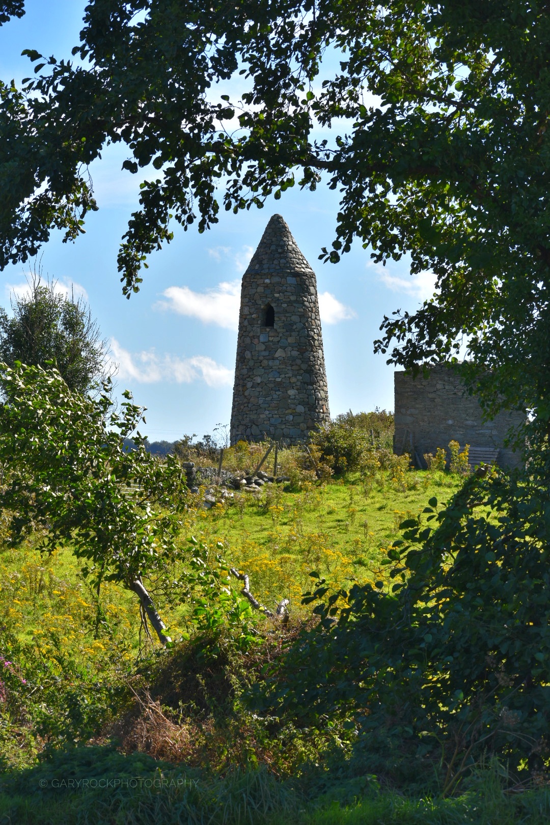 Inishowen landscape with historic stone tower
